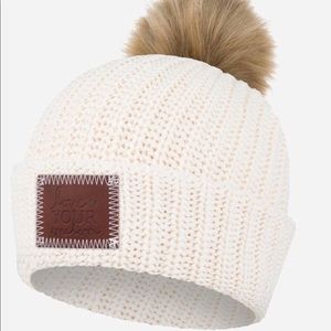 Love Your Melon white beanie with natural Pom.